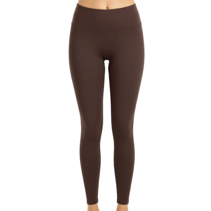 Brown leggings on a white background